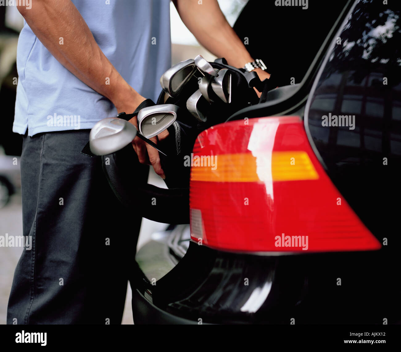 Golf clubs in boot of car hires stock photography and images Alamy