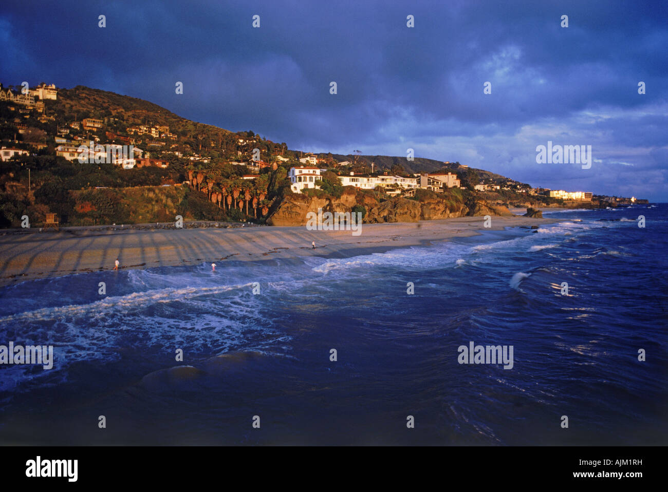 Coastal homes at Woods Cove in Laguna Beach in sunset light  Southern California Stock Photo