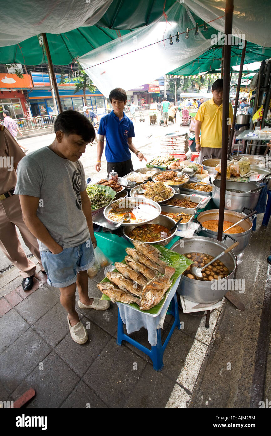 Street hawker market stall vendor Stock Photo Alamy