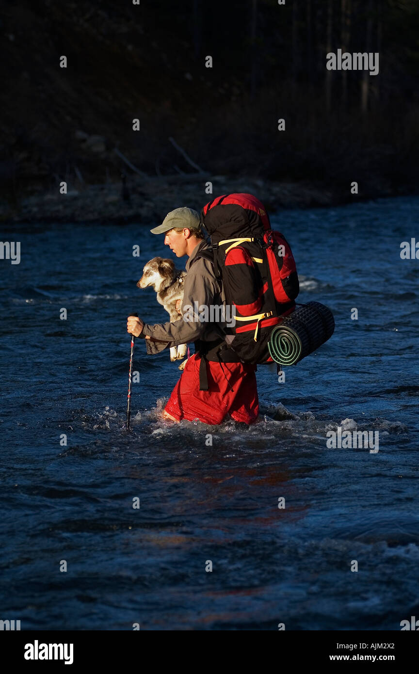 Man carrying his dog hi-res stock photography and images - Alamy