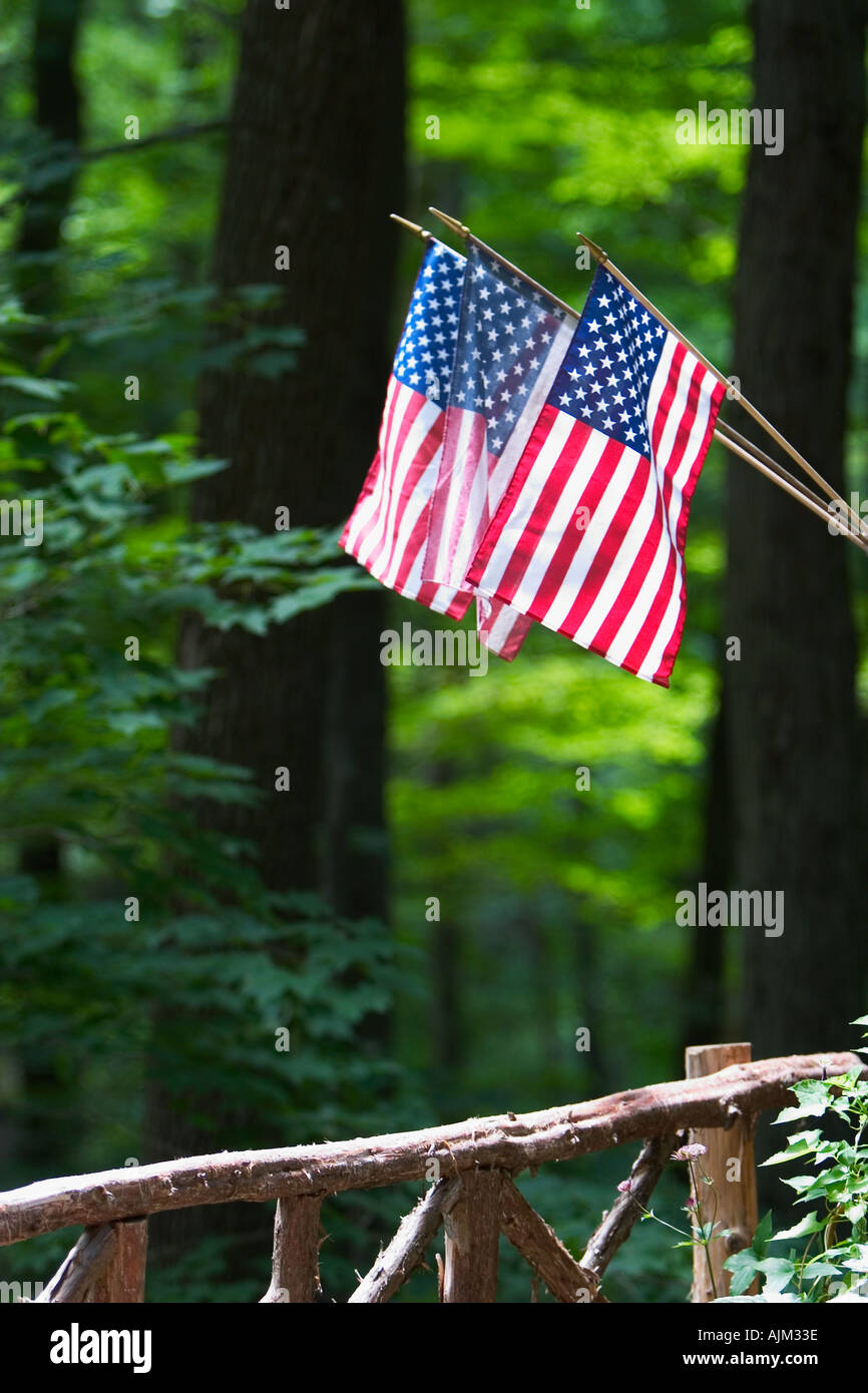 American flags near rustic cedar fence Stock Photo - Alamy