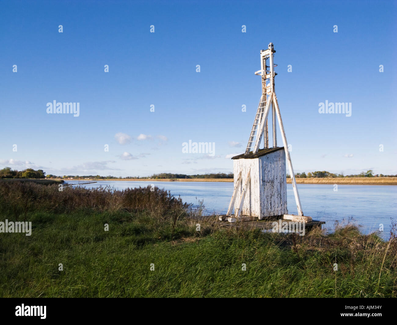 Tidal River Ouse and beacon at Reedness East Yorkshire UK Stock Photo