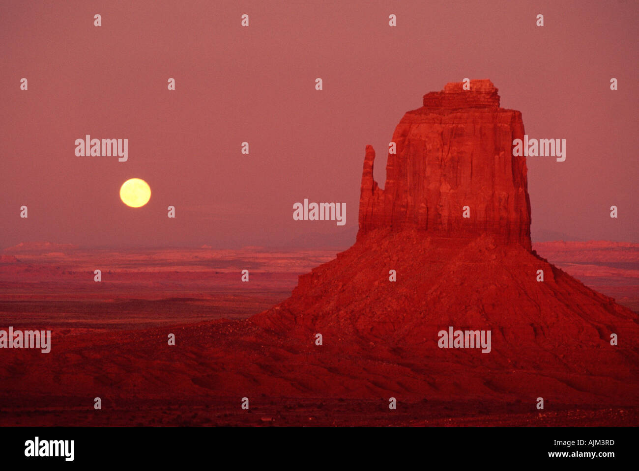 Moonrise over buttes in Monument Valley Navajo Nation Arizona Stock Photo