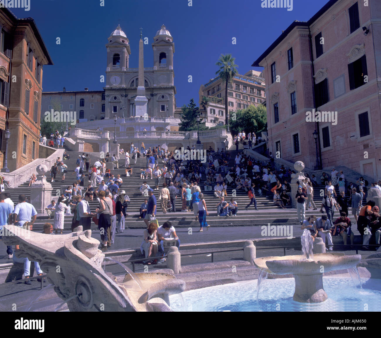 Spanish Stairs leading up to church of Trinità dei Monti and in front fontain at Piazza di Spagna downtown Rome Italy Stock Photo