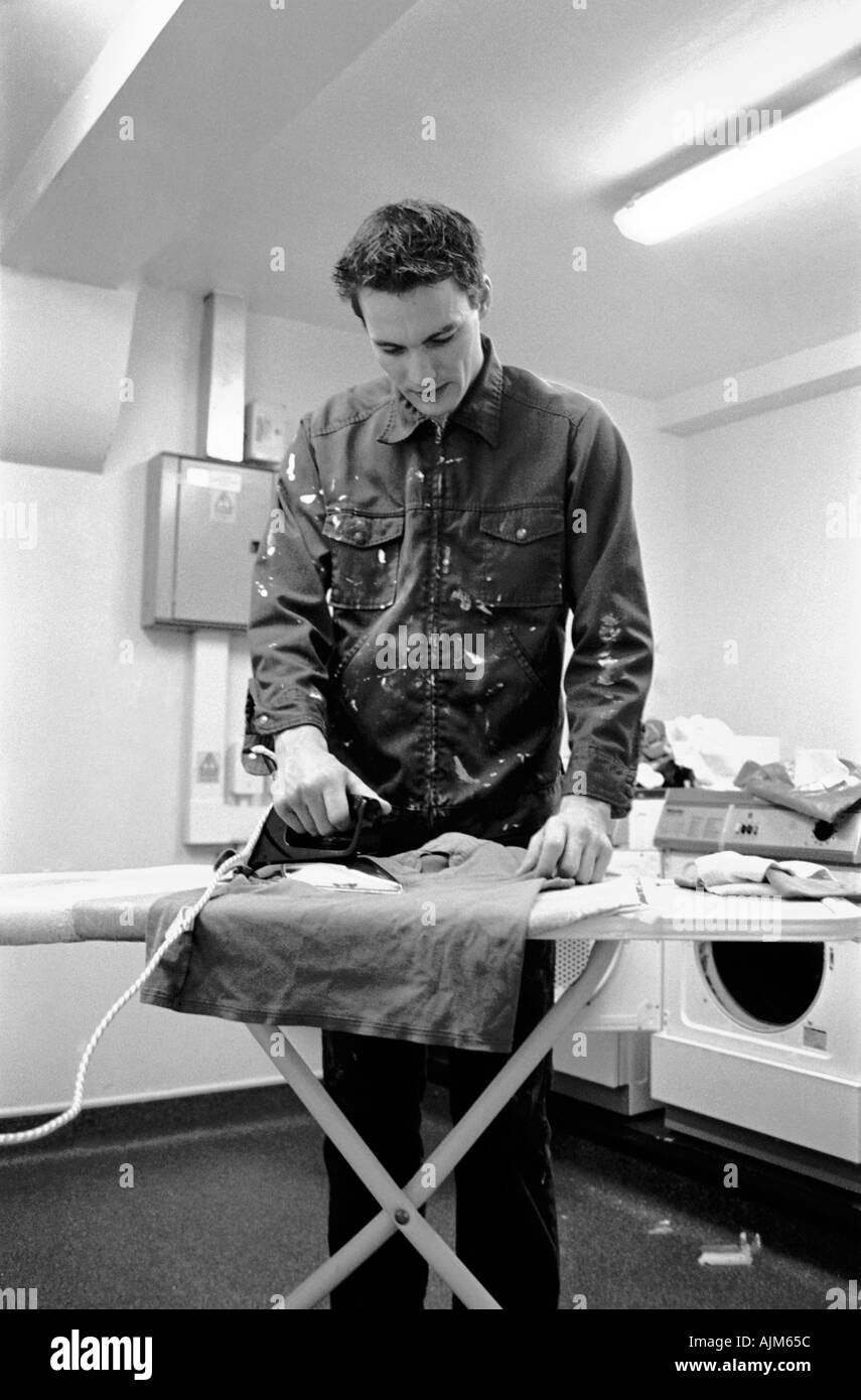 Ironing clothes Black and White Stock Photos & Images - Alamy
