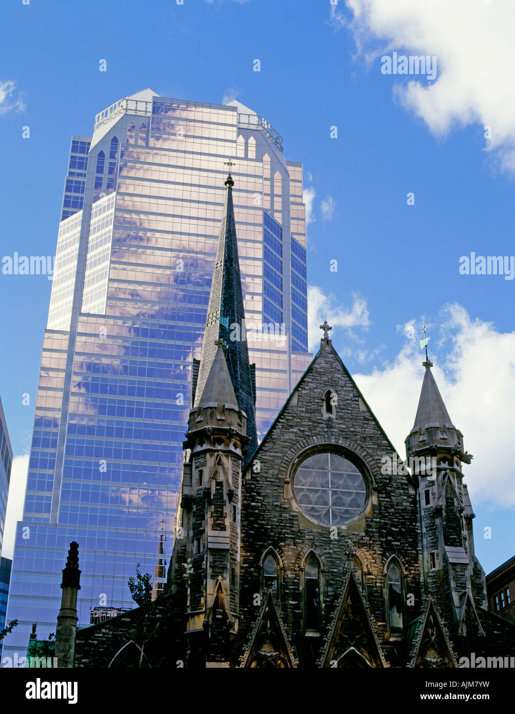 Exterior of a church and a skyscraper, Montreal, Quebec Stock Photo