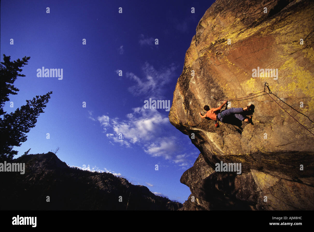 A man rock climbing Short Subject at Donner Summit CA Stock Photo