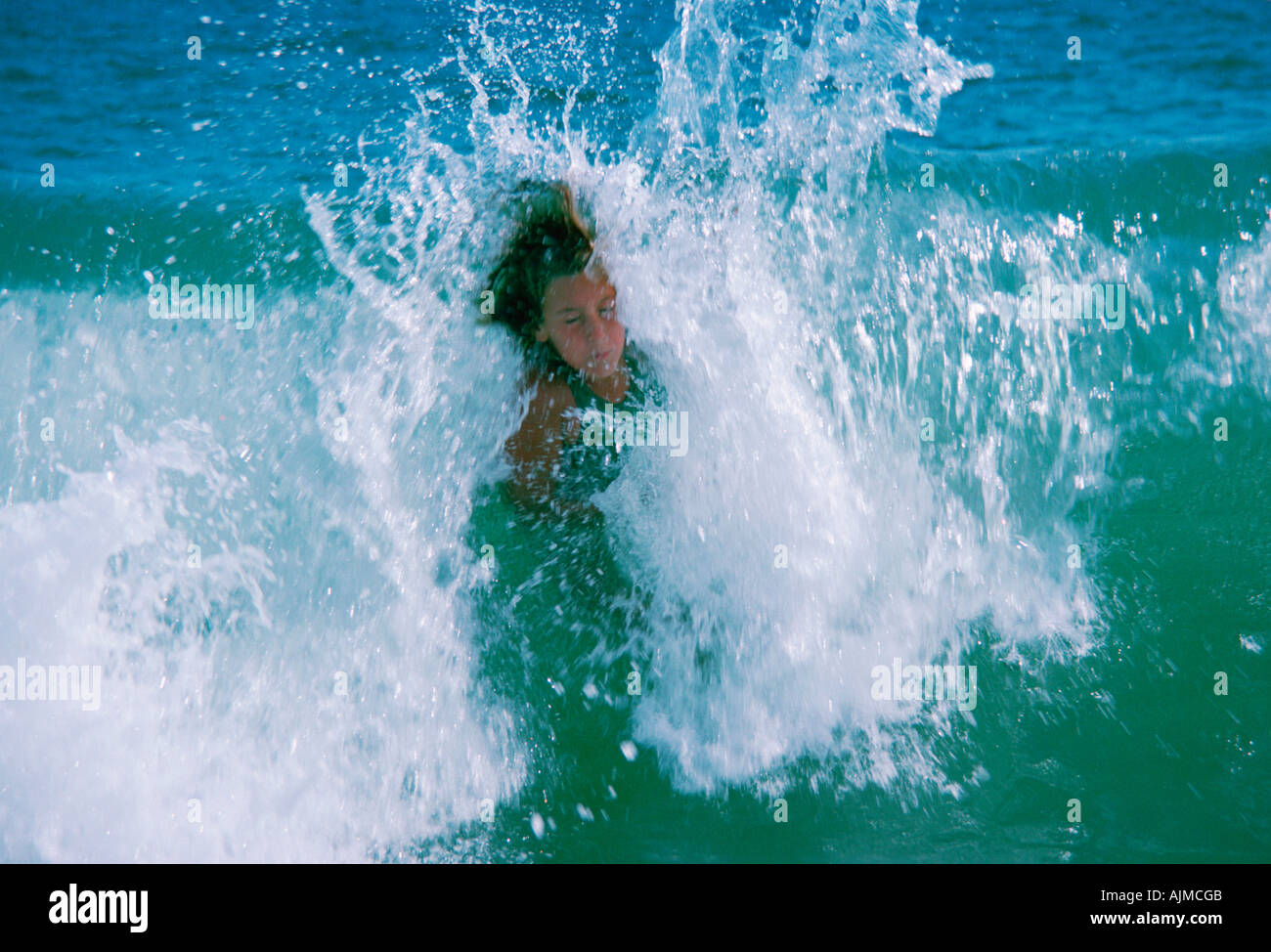 Boy bodysurfing Stock Photo