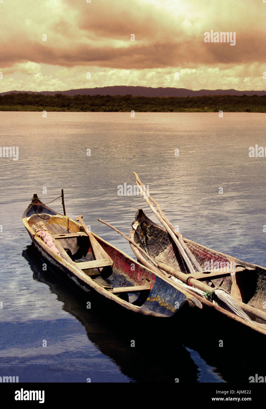 Two Kuna Indian dugout canoes at sunset San Blas Islands Panama Central America Stock Photo