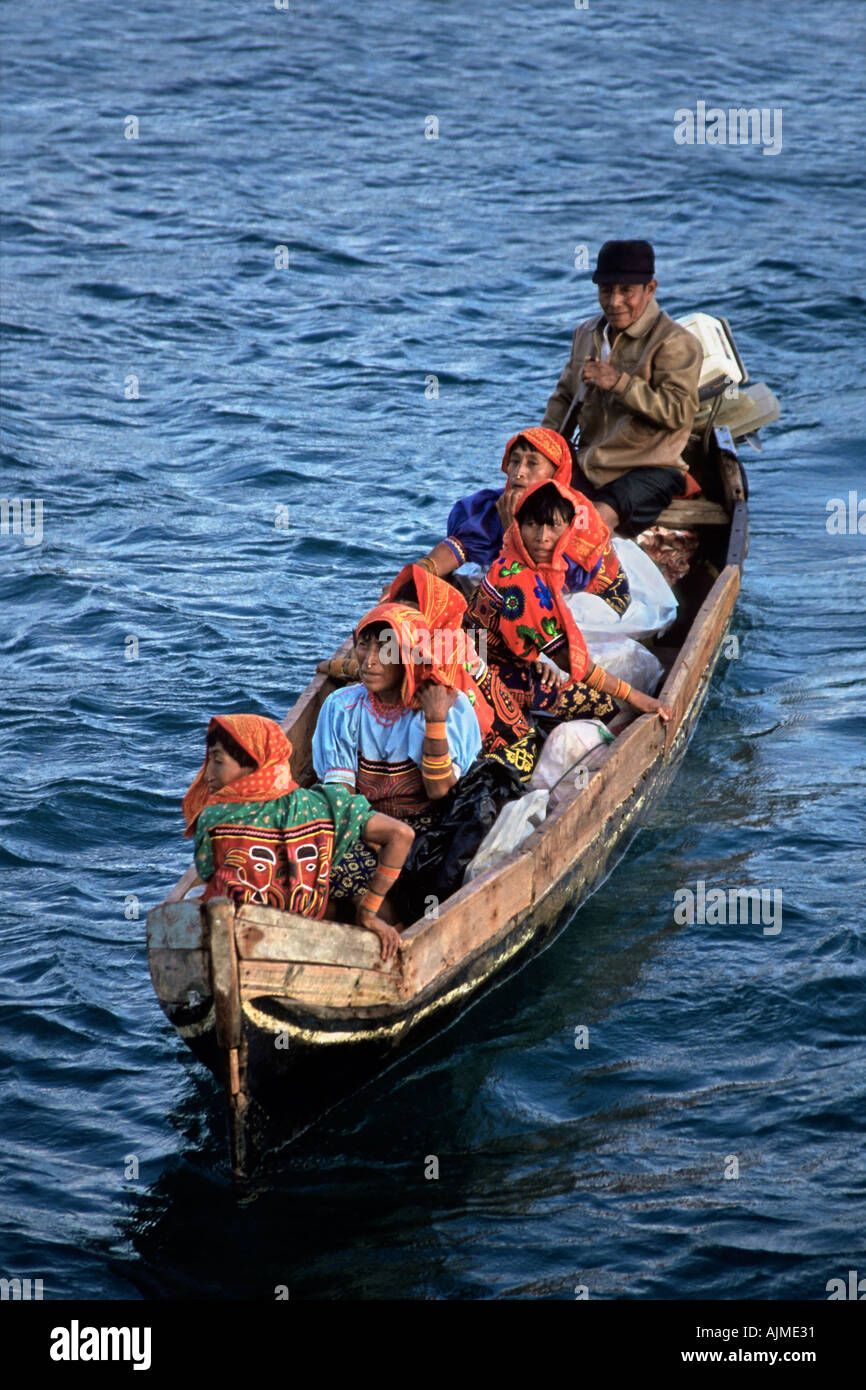 Kuna Indians in motorized dugout canoe San Blas Islands Pamama Central America Stock Photo