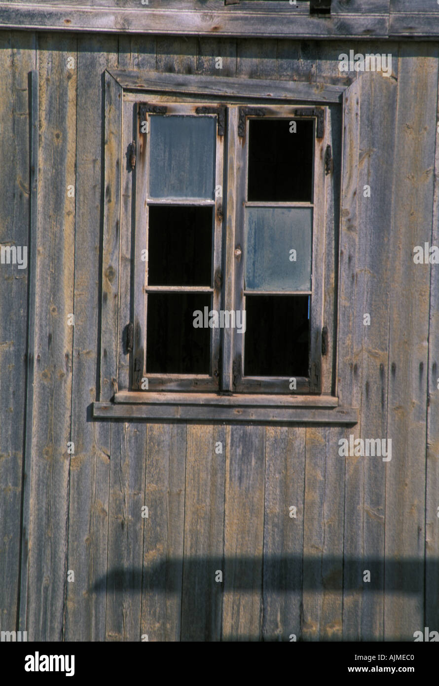Namibia Old wooden window frame at Elizabeth Bay diamond mining ghost town Namibia Stock Photo