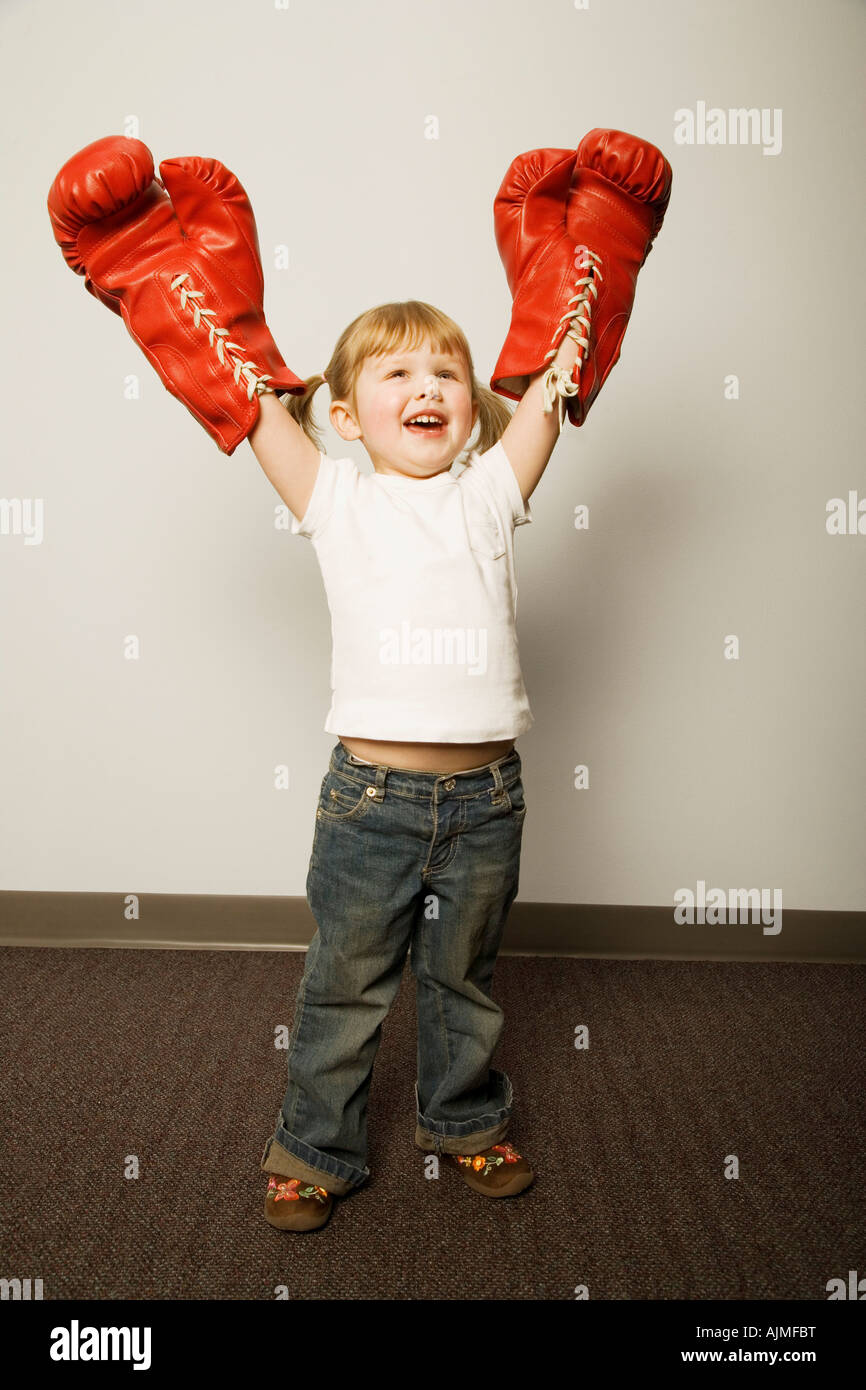 Girl wearing boxing gloves Stock Photo Alamy