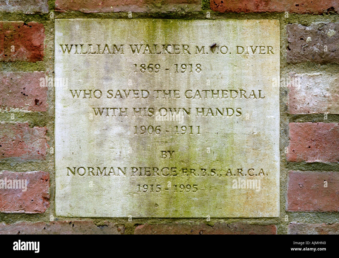 Plaque to the bronze sculpture of William Walker M.V.O the diver who saved  Winchester Cathedral Hampshire Stock Photo - Alamy