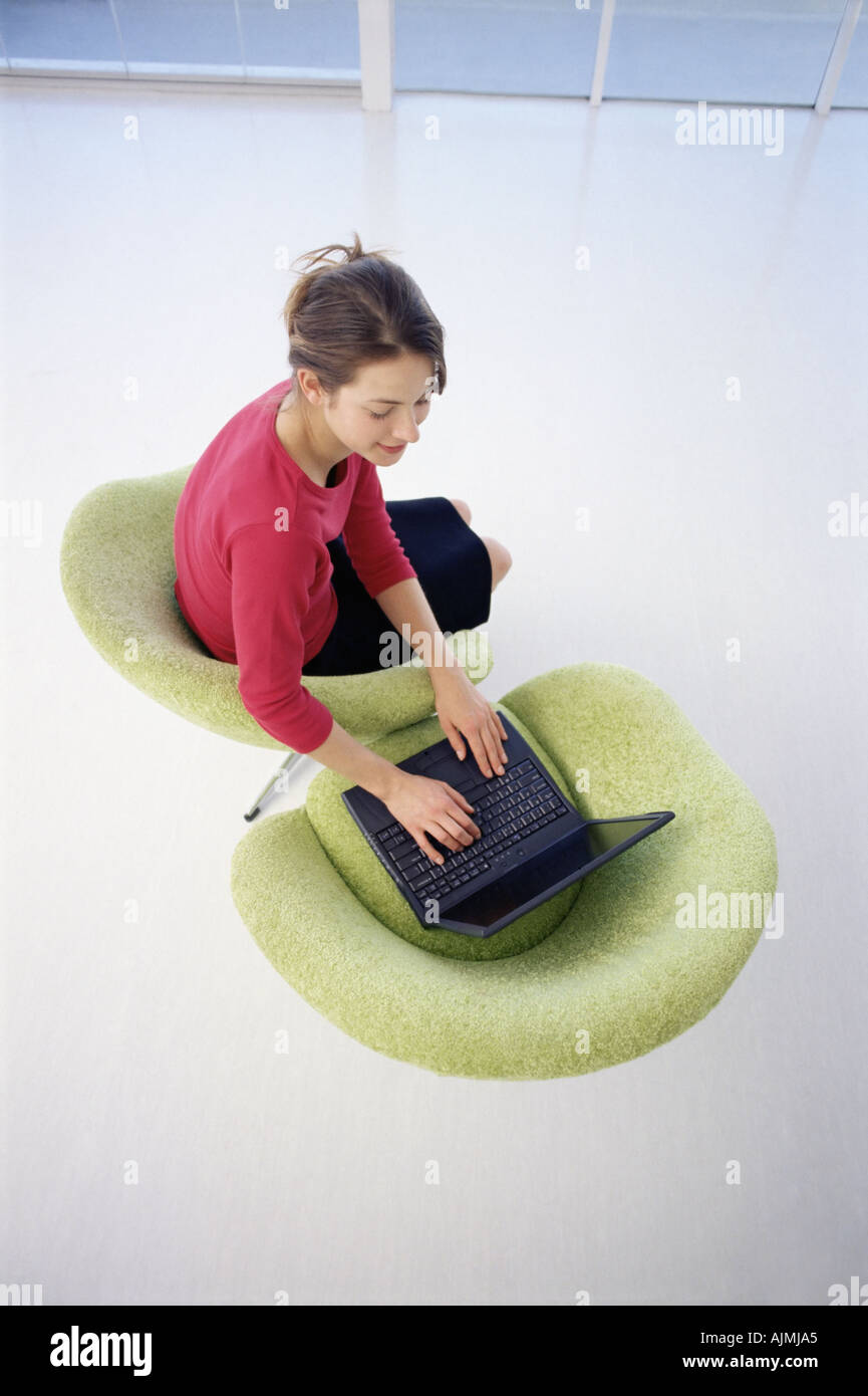 Office worker using laptop Stock Photo