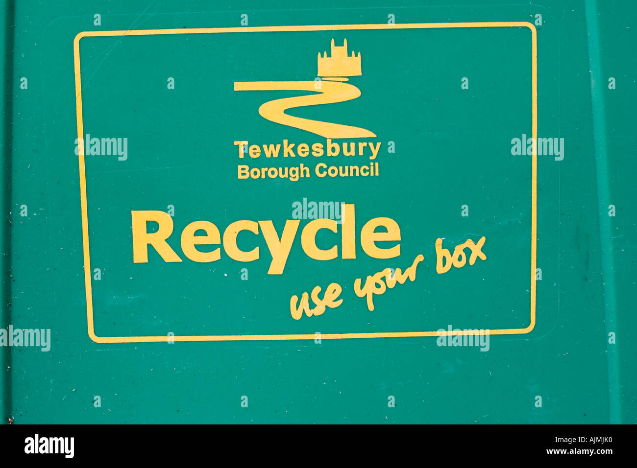 Close up of green recycle bin with Tewkesbury Borough Council logo and