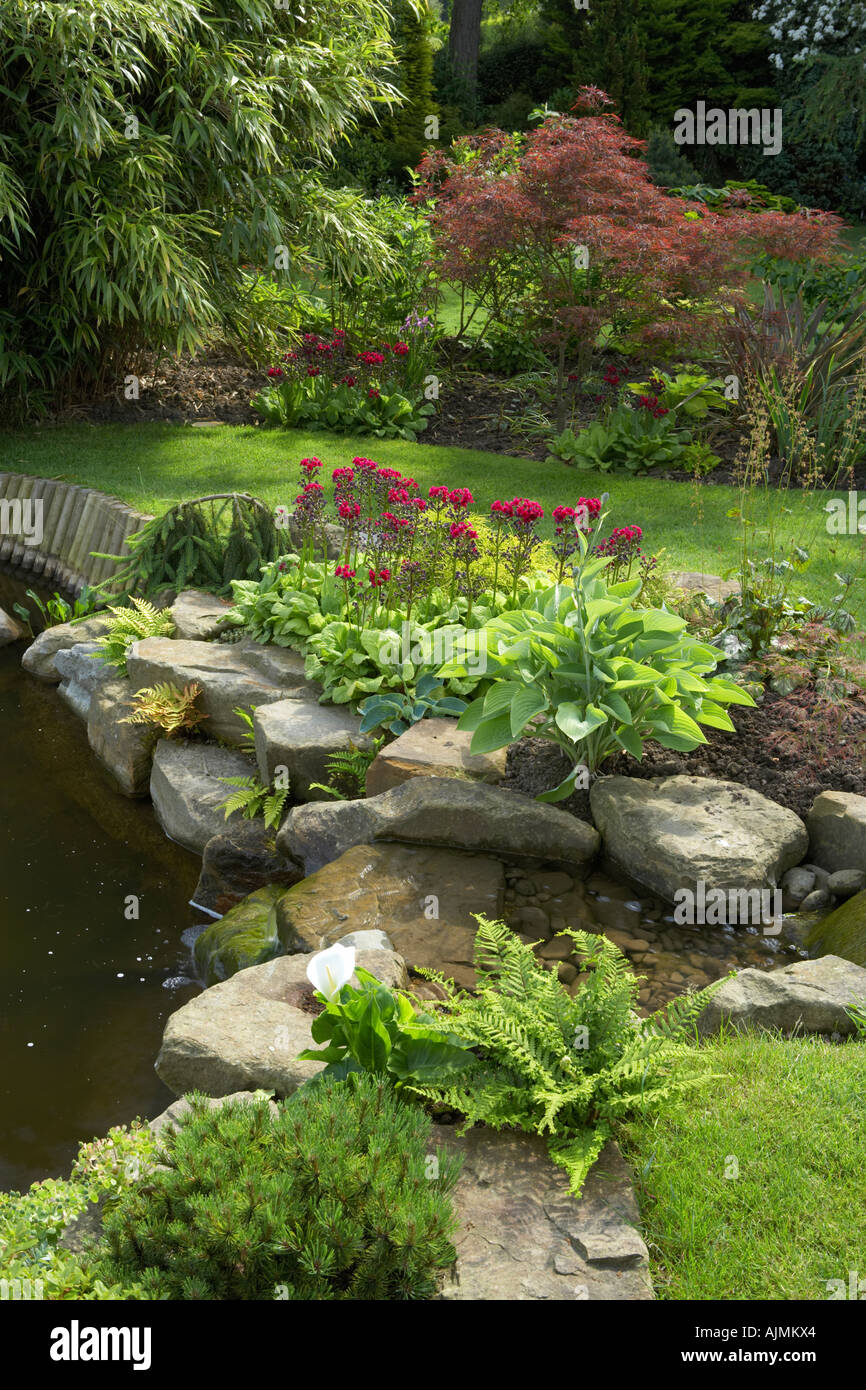 well planted garden pond Stock Photo