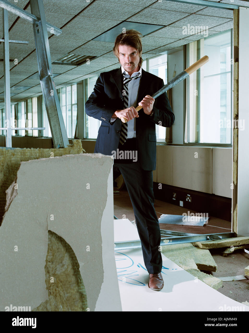 Businessman holding baseball bat Stock Photo