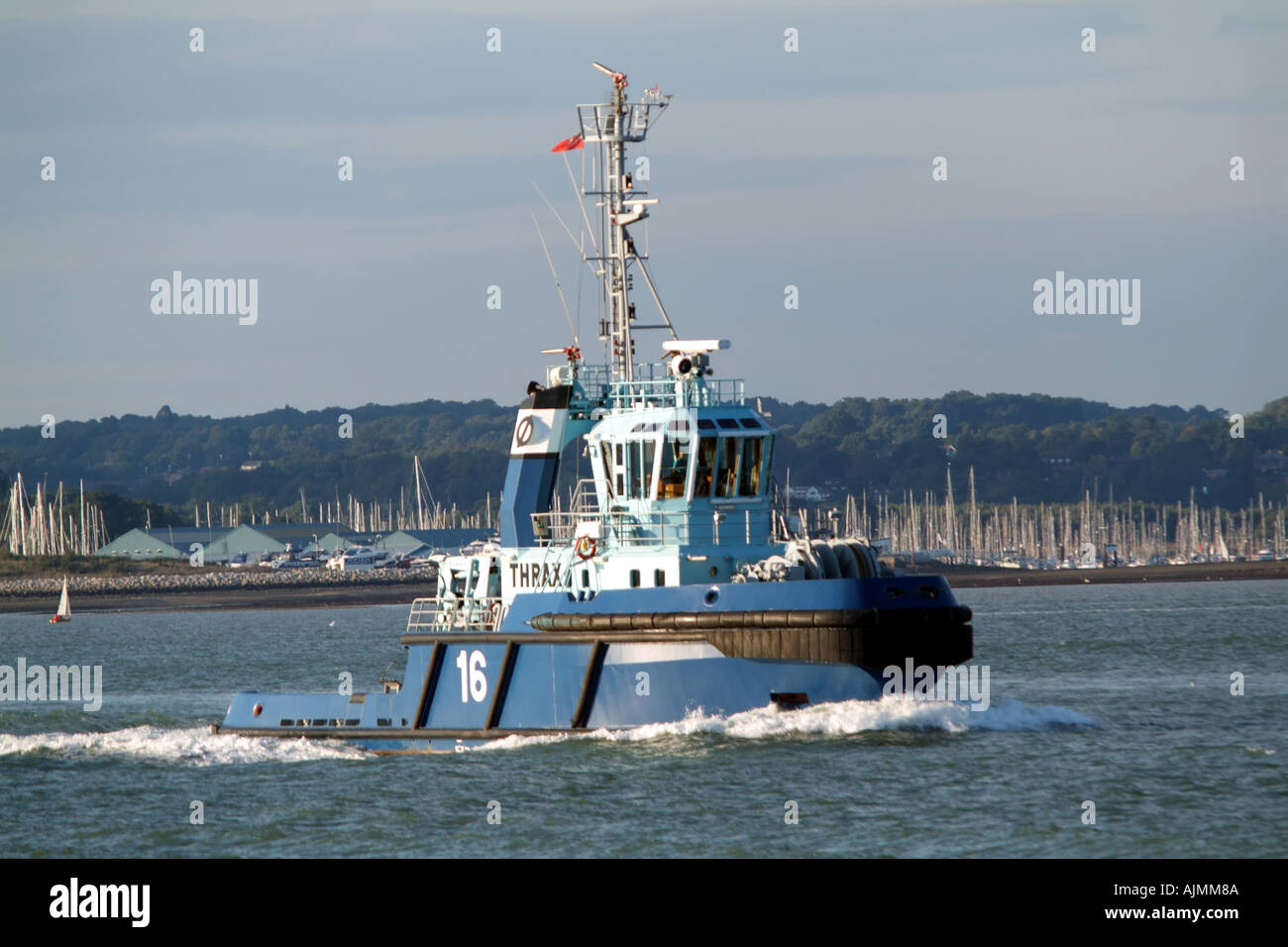 Peel a THRAX seagoing escort tug outbound on Southampton Water Hampshire southern England coastline UK Stock Photo
