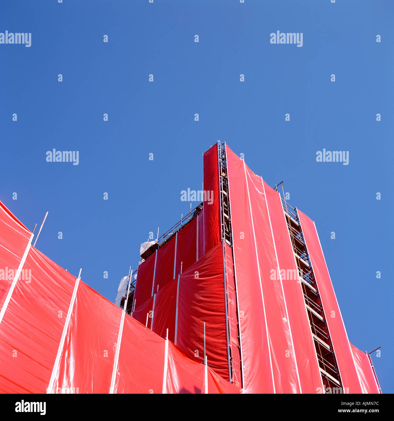 Tarpaulin on construction site Stock Photo - Alamy