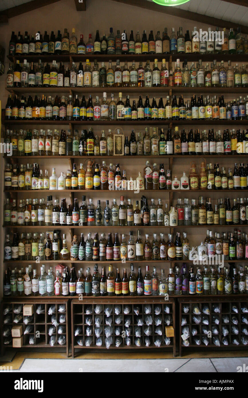 Shelves with alcoholic drink bottles inside a liquor store called