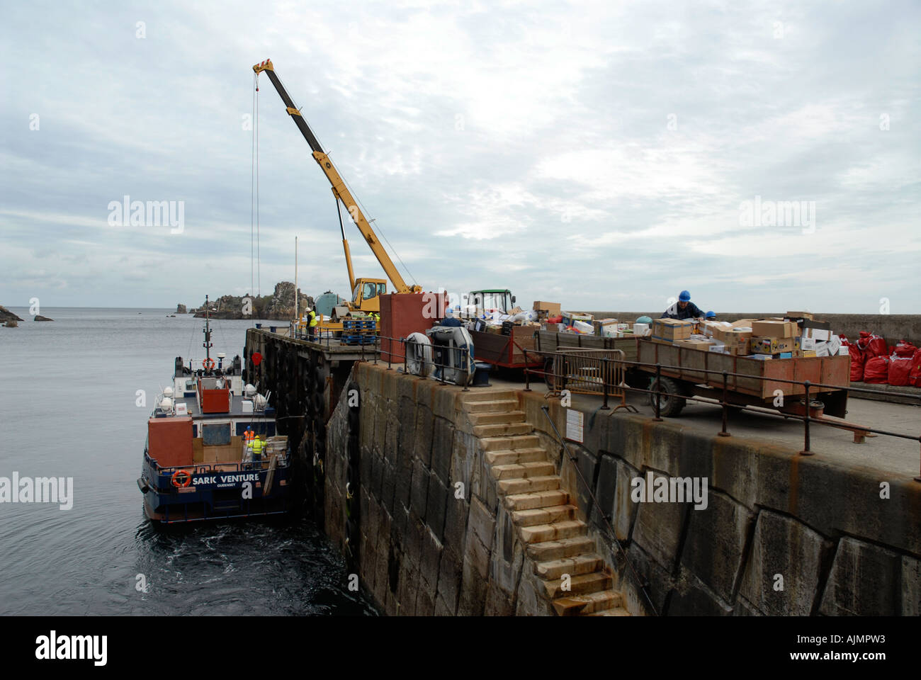 Goods delivery Sark harbour in the Channel Islands Stock Photo Alamy