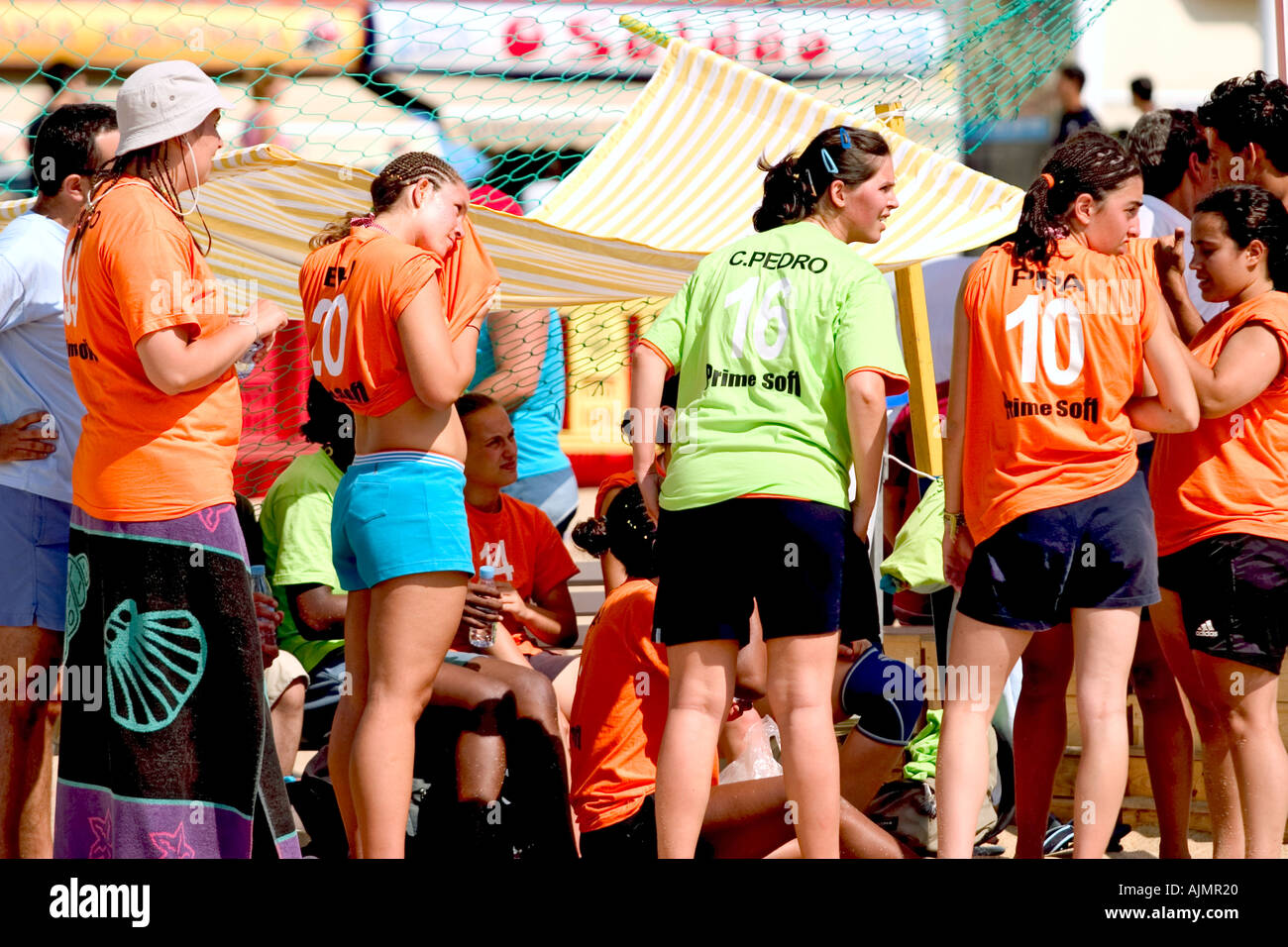 sport handball game action on beach with female girls women team in