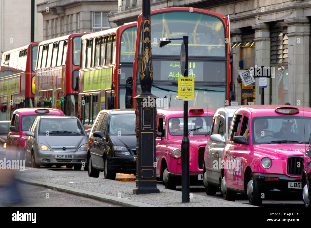 A view of traffic along the Strand in London. Stock Photo
