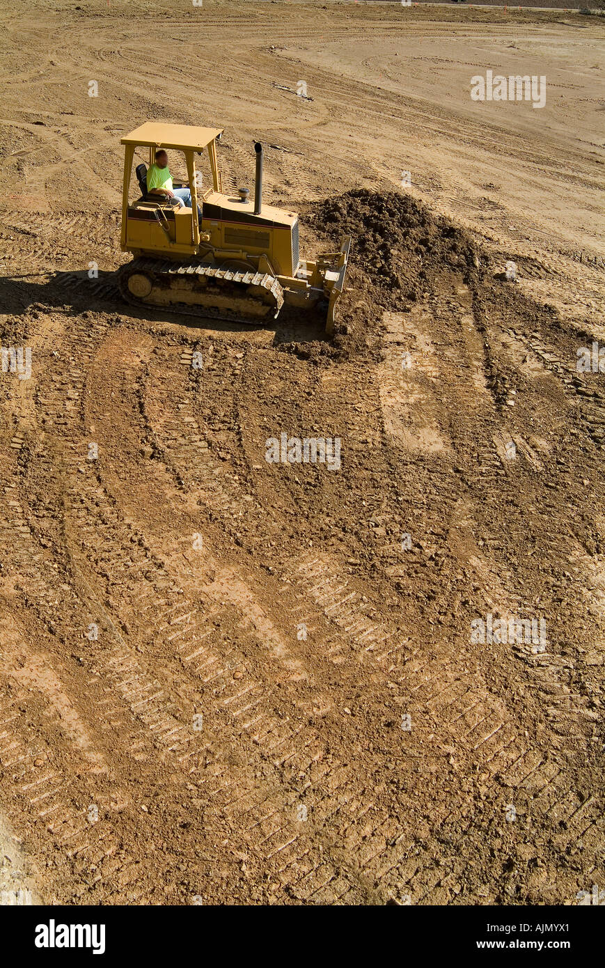 Bulldozer Pushing Dirt At Construction Site Stock Photo Alamy