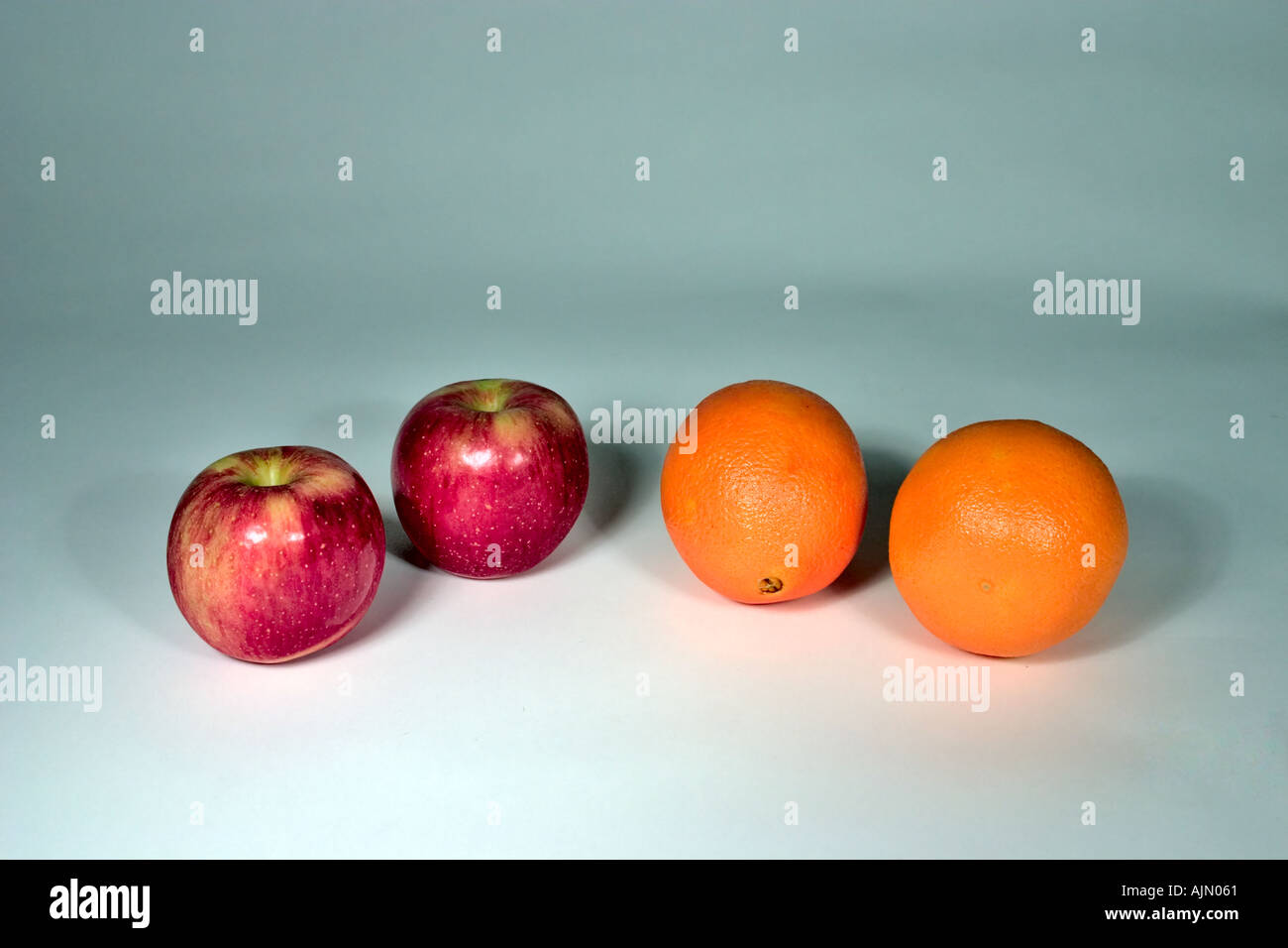 https://c8.alamy.com/comp/AJN061/comparing-apples-to-oranges-AJN061.jpg