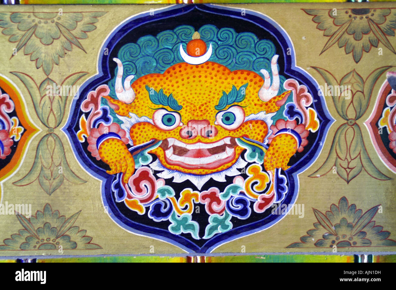 Tibetan buddhist holy symbol wrathful deity painting mural Leh Ladakh Stock Photo