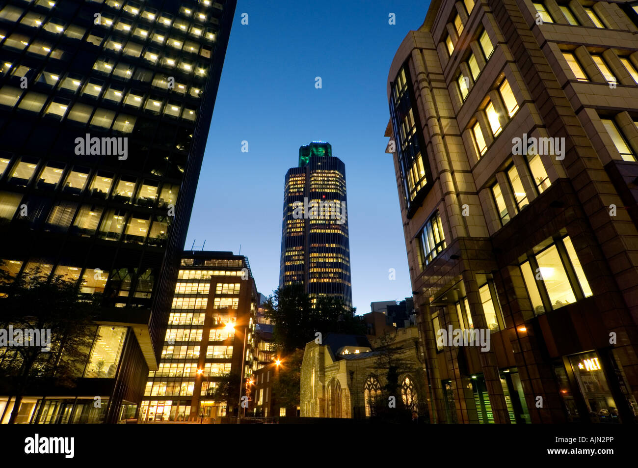 old nat west tower tower 52 illuminated at night central london financial district london england uk Stock Photo