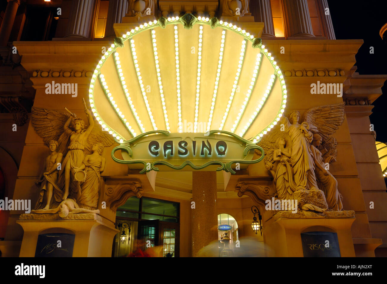 detail of casino shell design neon sign at night paris hotel las vegas ...