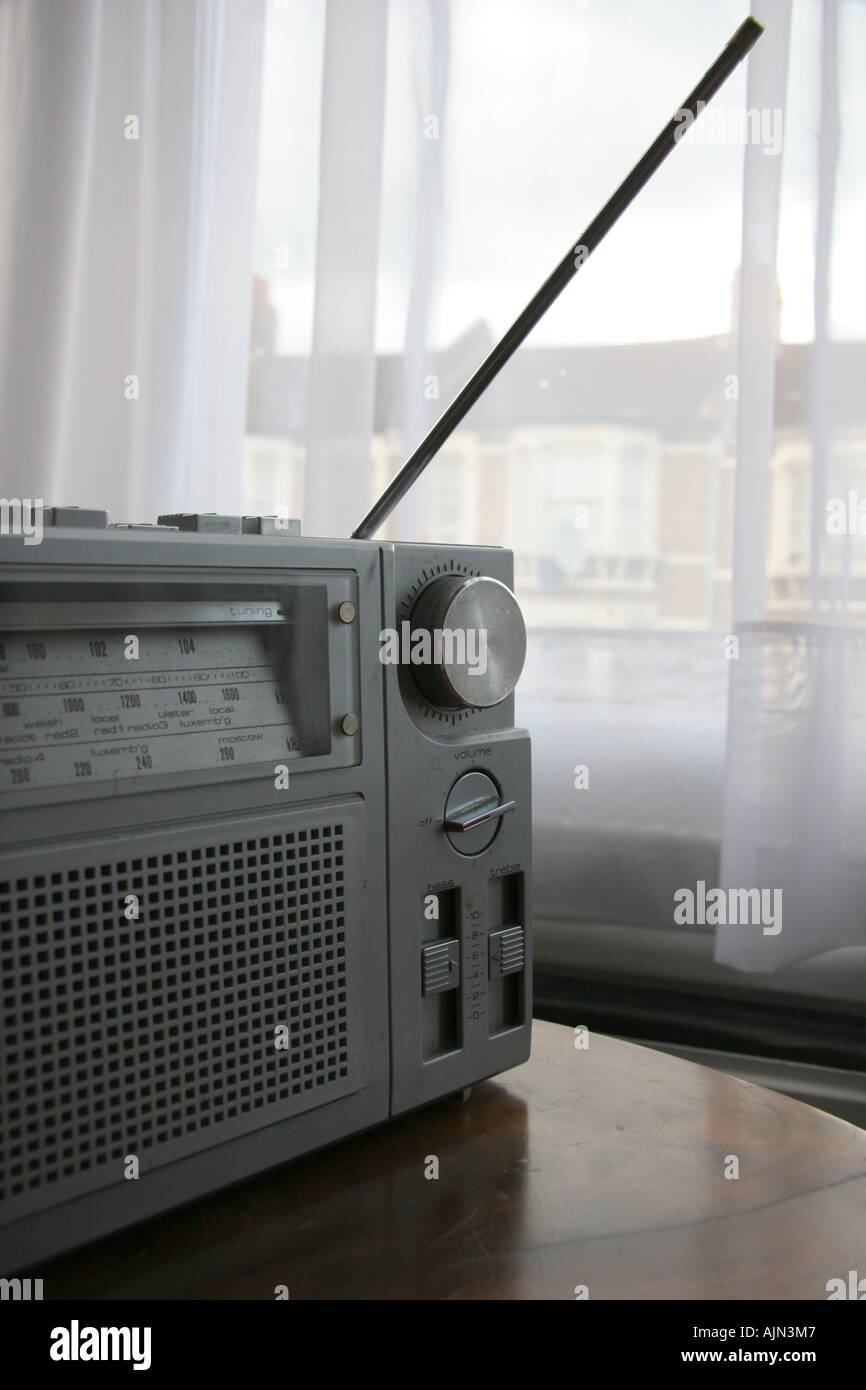 analogue radio on coffee table next to window Stock Photo Alamy
