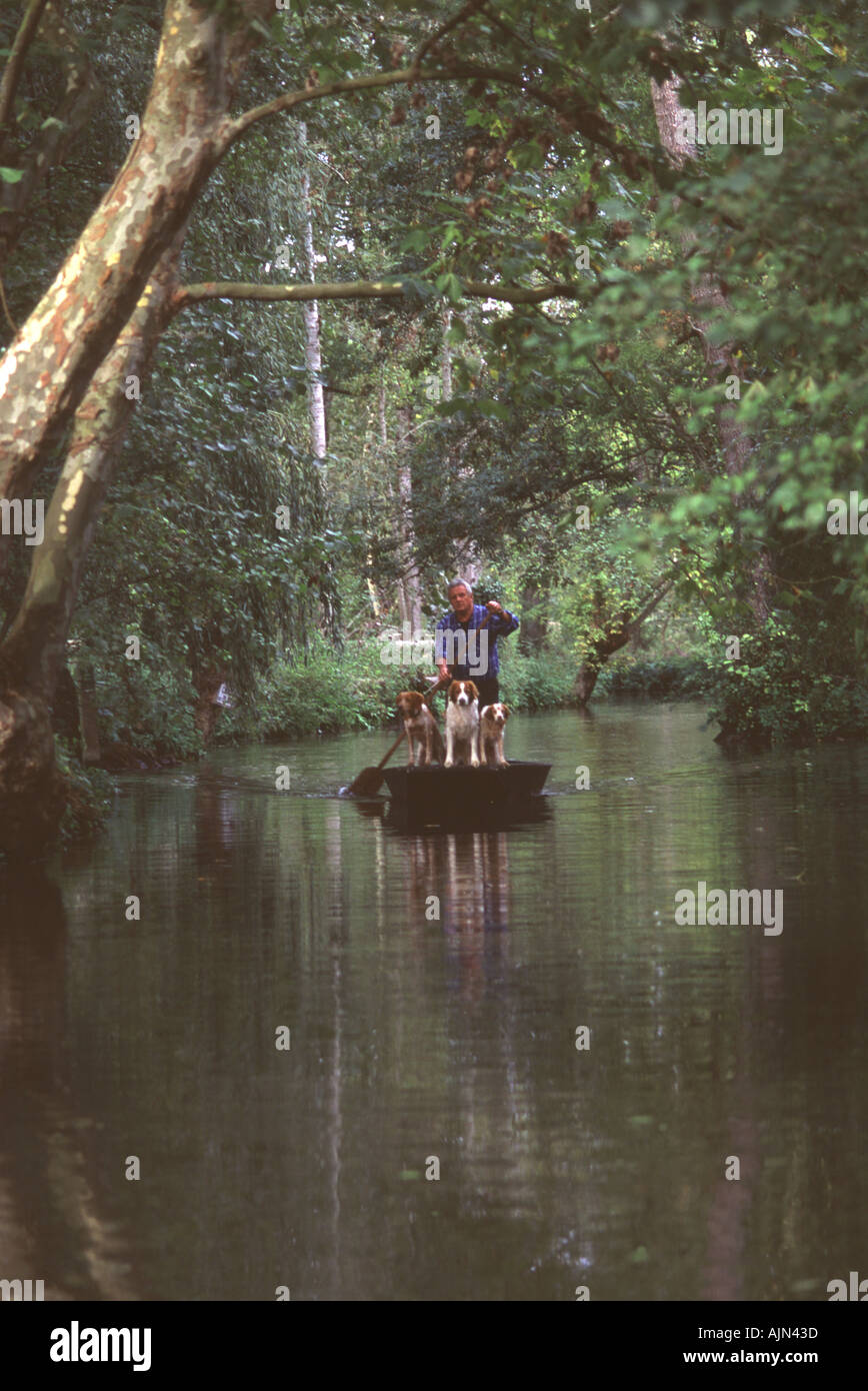 Western France, Canal in what is called the Green Venice. Hunter with