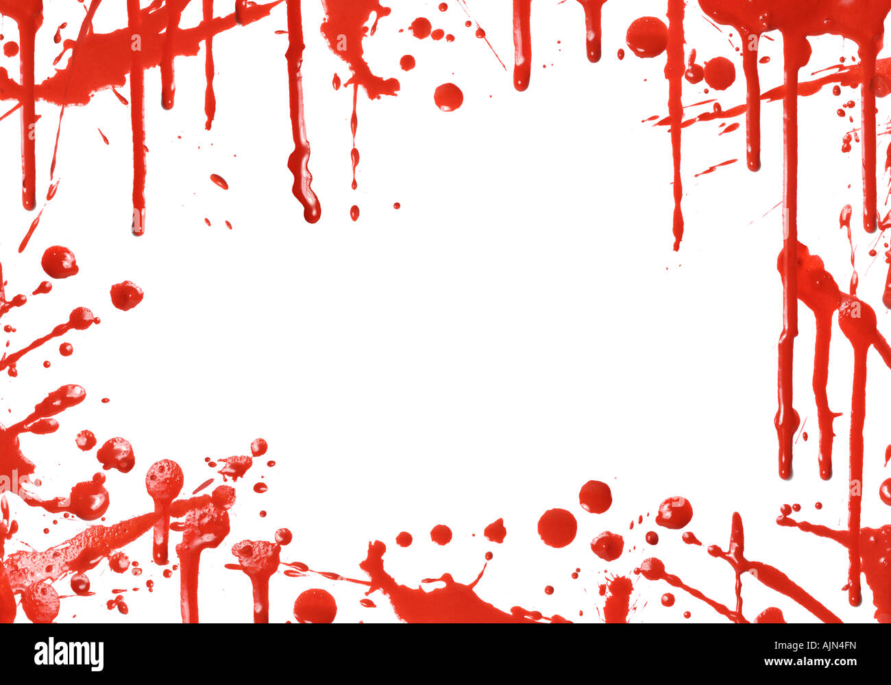 Red paint drips over white canvas background Stock Photo