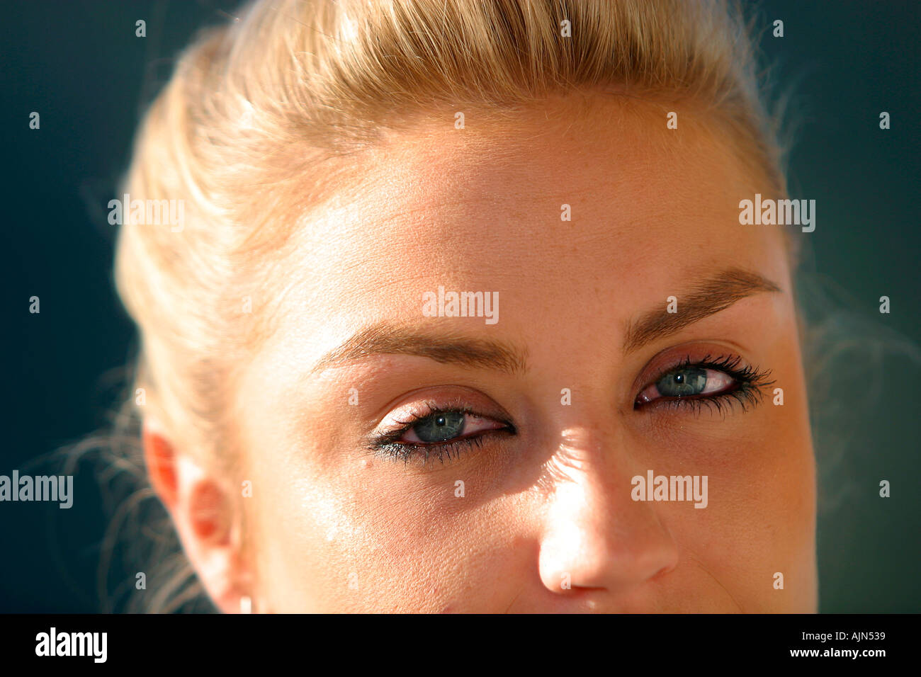 Blonde woman eyes up close hi-res stock photography and images - Alamy