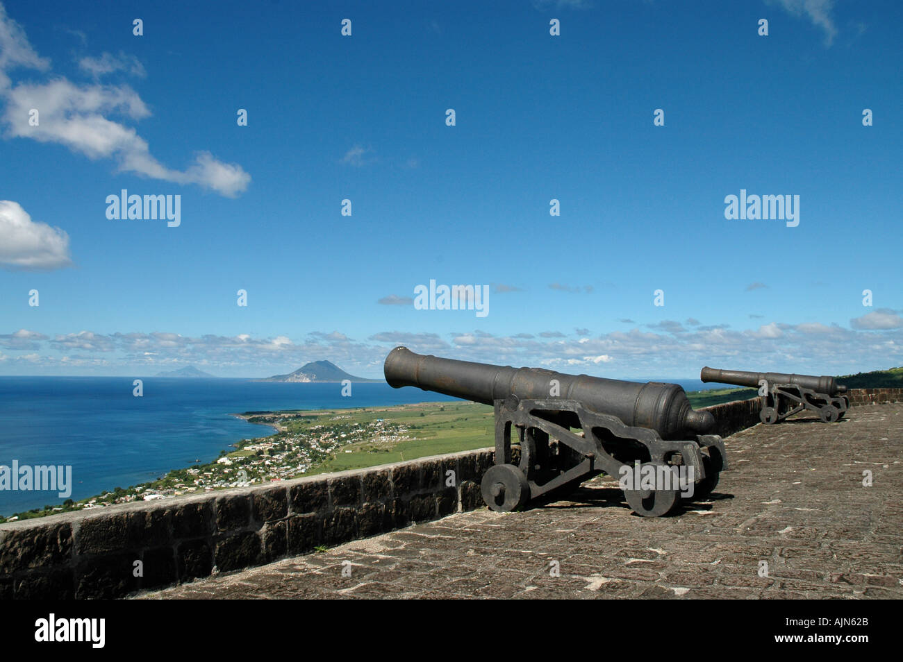 St Kitts Caribbean West Indies Brimstone Hill Fortress Cannon with St Eustatius and Saba in background Stock Photo