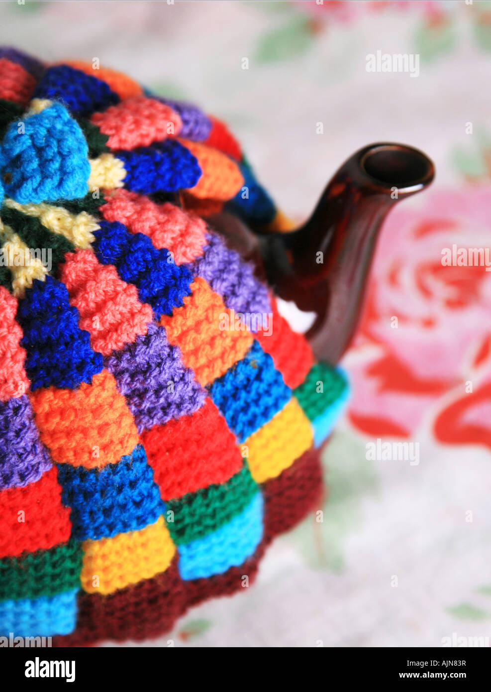 Tea Pot with Cosy Stock Photo
