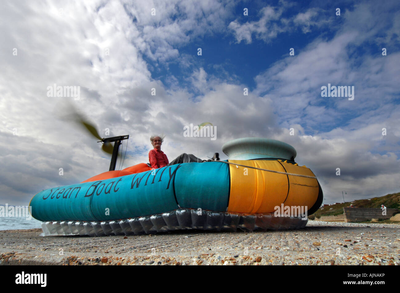 Scientist drives human powered hovercraft Stock Photo
