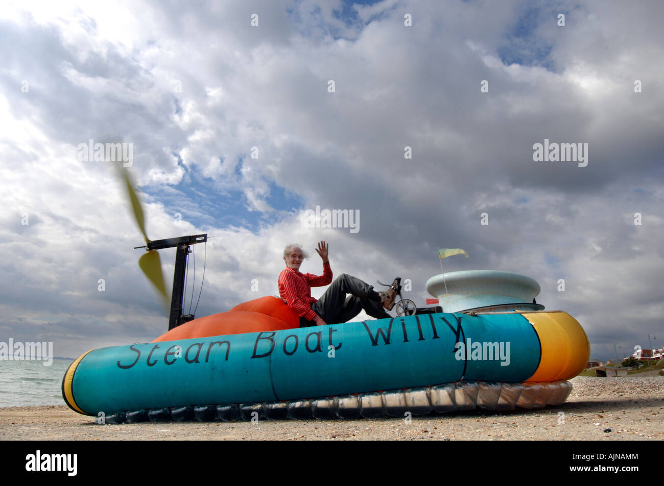 Scientist drives human powered hovercraft Stock Photo