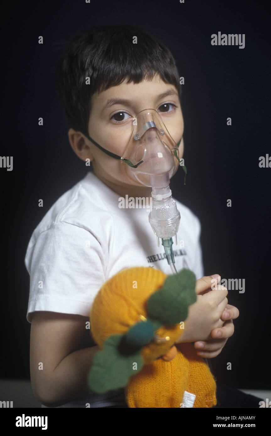 Boy undergoing a Ventolin treatment for asthma with a nebulizer Stock Photo  - Alamy
