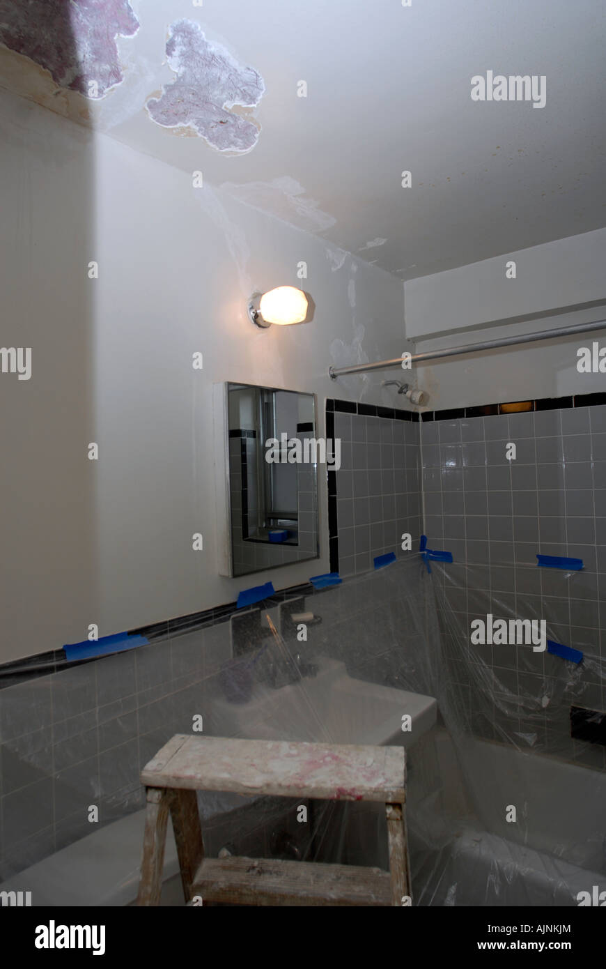 A bathroom is prepared for plastering to repair damage from leaks Stock