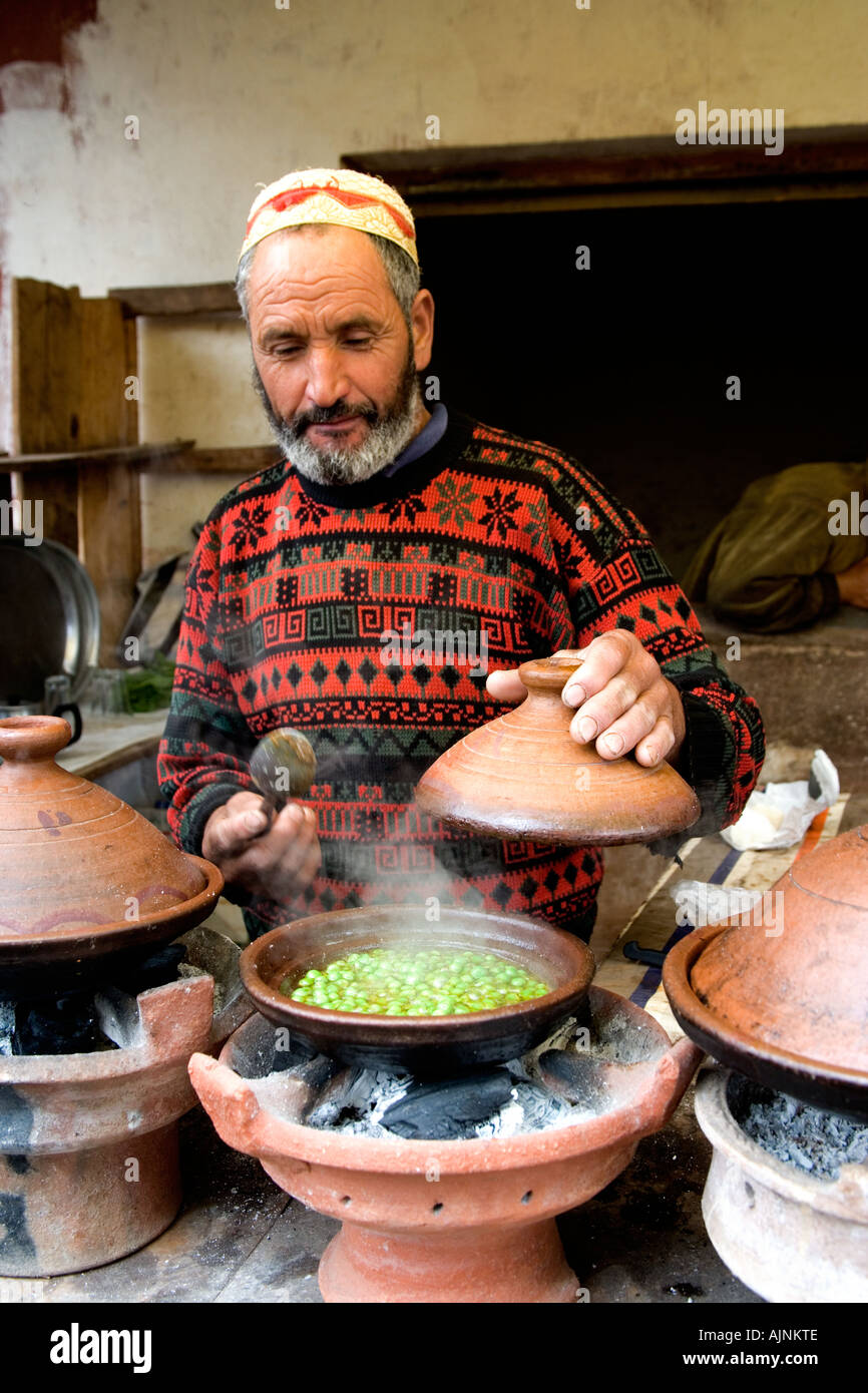 Berber Man at the Market Cooking a Tagine of Lima Beans, Ourika Valley, Morocco Stock Photo Alamy