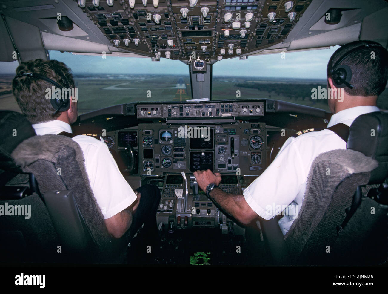 Pilot and co pilot in cockpit of Boeing 767 Australia Horizontal  Stock Photo