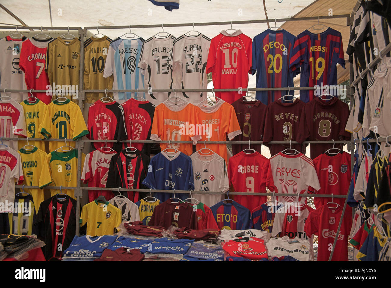 Stock photograph of turkish market stall selling fake football shirts Stock Photo
