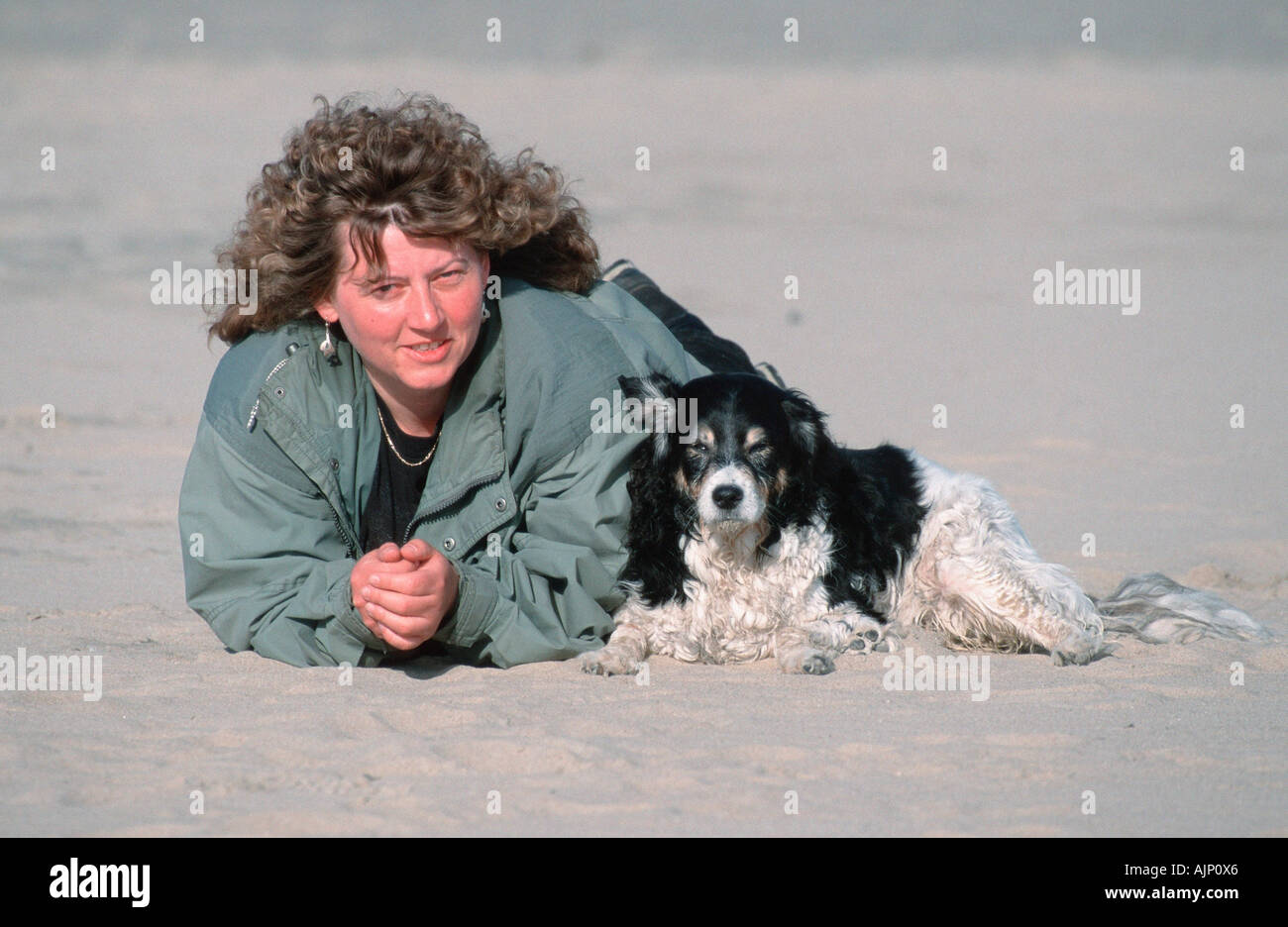 Woman and Mixed Breed Dog Stock Photo