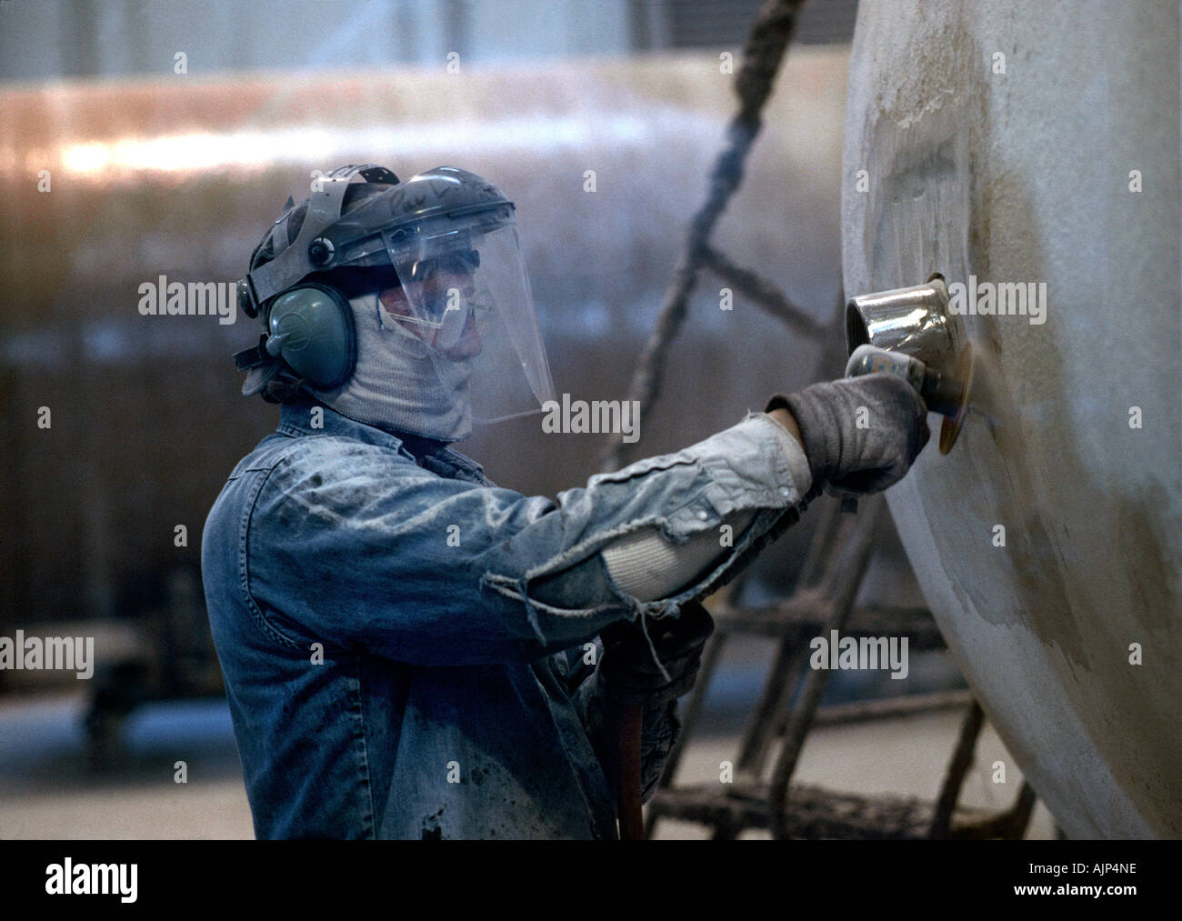 Construction worker uses sander hi-res stock photography and images - Alamy