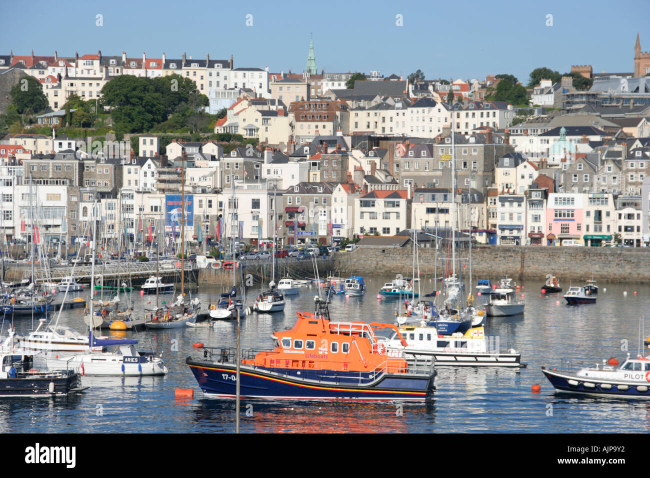 st peter's port marina yachts lifeboat guernsey channel island summertime  europe Stock Photo - Alamy