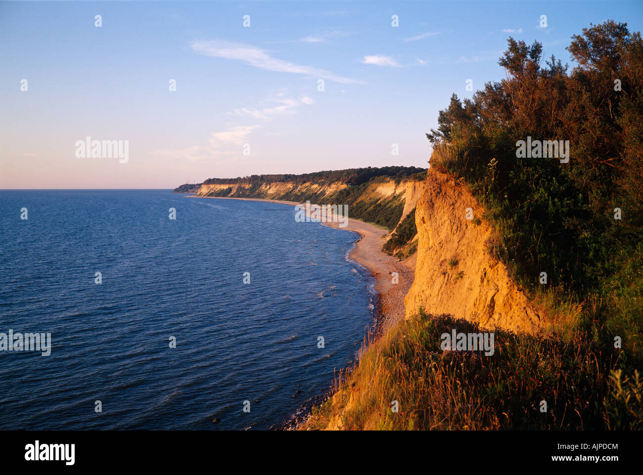 Sunset at the baltic sea (Kaliningrad Oblast, russian exclave). The cliffs of the AMBER COAST reach a hight of nearly 200 feet. Stock Photo