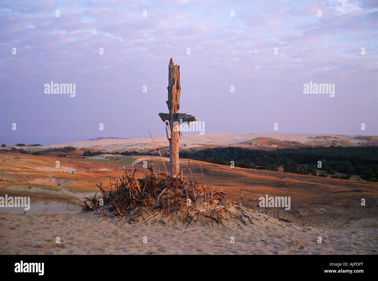 The cross near Nida (Curonian Spit, Lithuania) reminds in the sculptor Rimas Dugintis, who self-immolated in 1990 in the dunes. Stock Photo